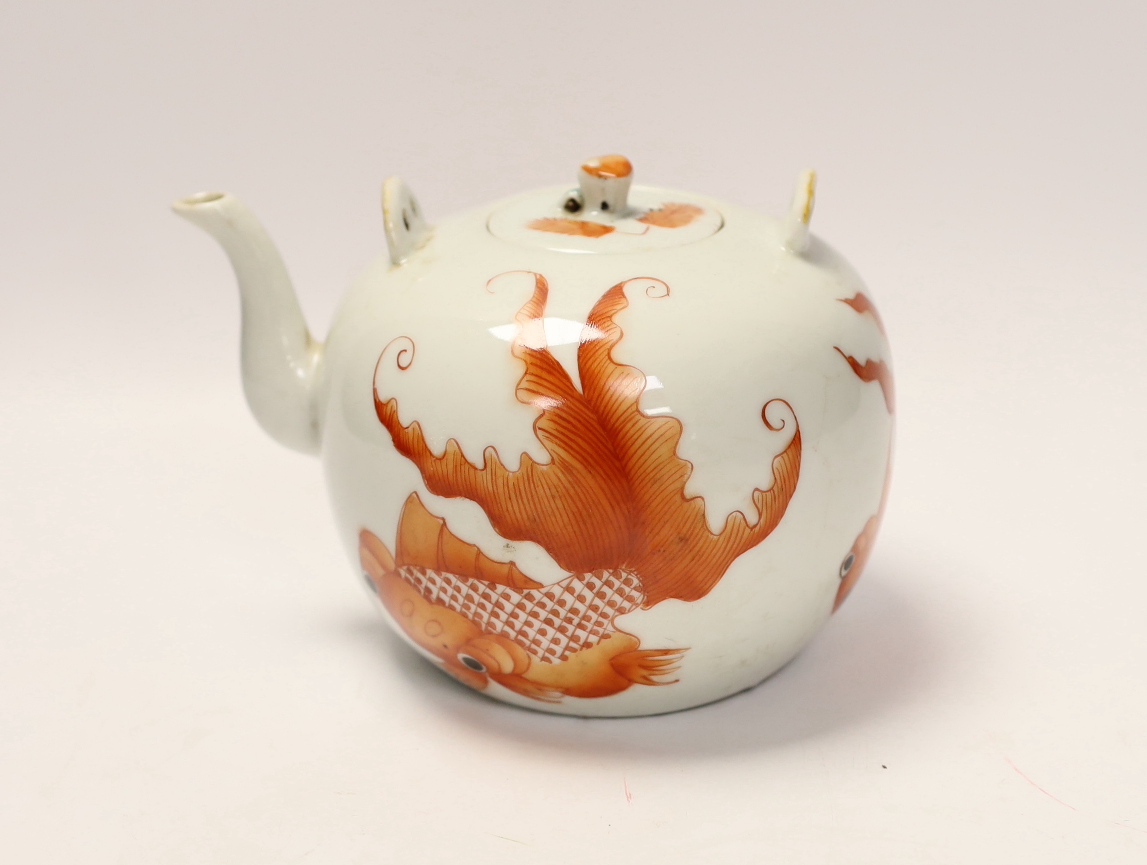 A Chinese iron red enamelled globular teapot, 11.5cm